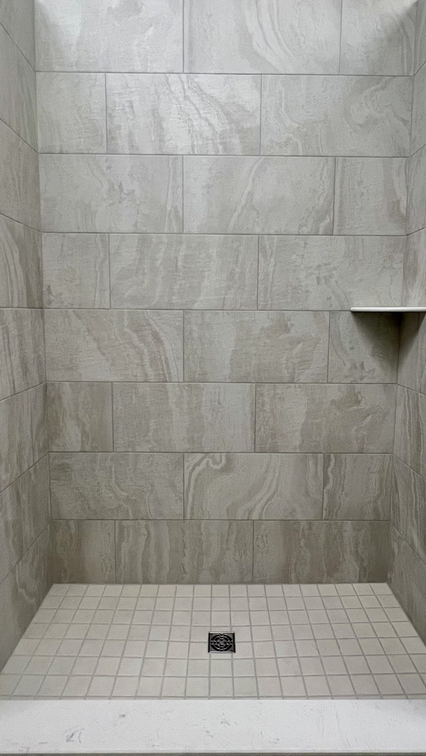 Ivory modern tiled shower stall