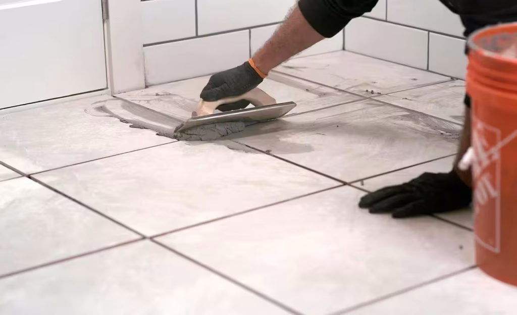 spreading grout