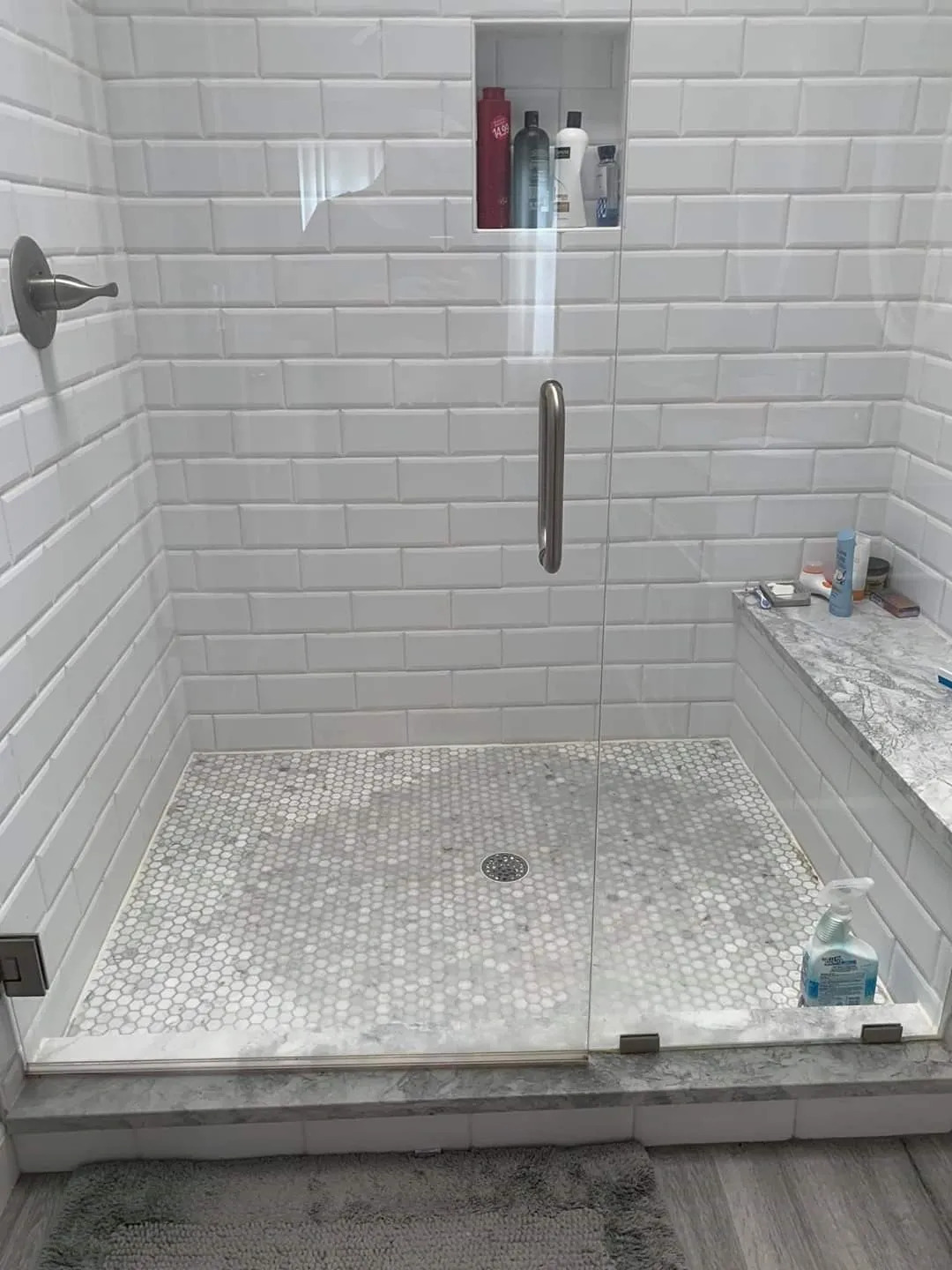 marble shower floor stained