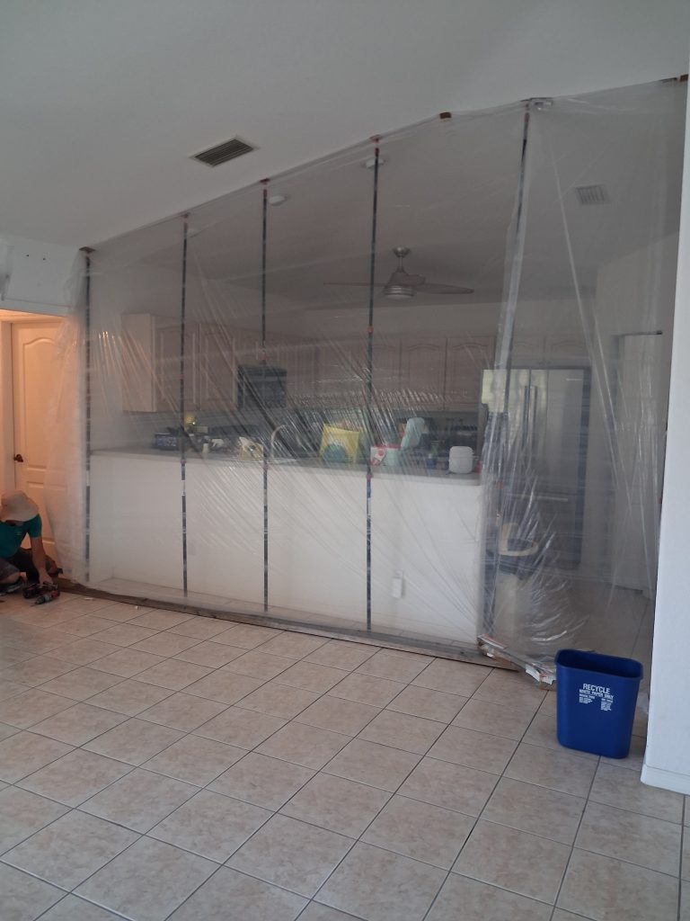 How Do You Protect a Kitchen While Demo Is Happening Right Next to It? 1 plastic during demo